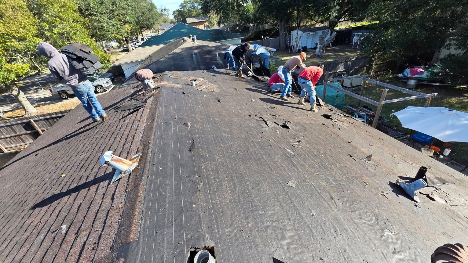 Tear-off in progress on residential roof